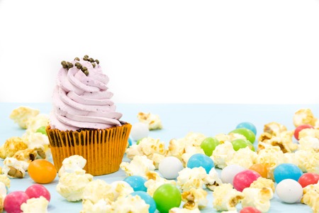 Party background with cupcakes and confettiの写真素材