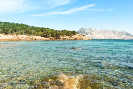 A view of a wonderful beach Sardinia, Italy. the beautiful nature of the Mediterranean, clear blue water.の写真素材