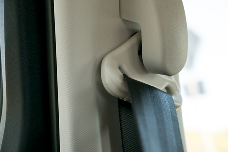 seat belt on a beige leather seatの写真素材