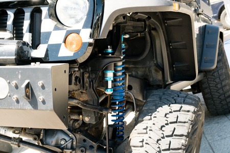 Detail of a Off-Road Tire Covered with Muddの写真素材