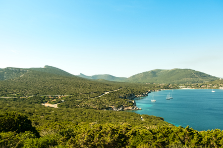 View on the Spanish Tower and the beach Mare Pintau in Sardinia, Italy.の写真素材