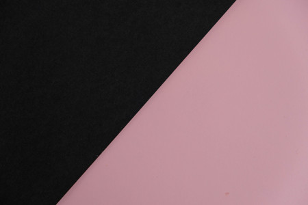 pink torn paper element over black background.の写真素材
