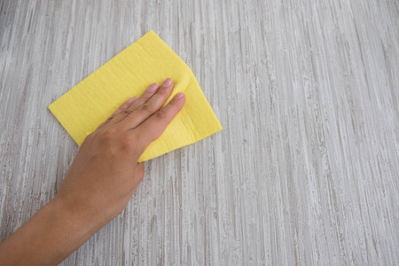 Housemaid cleaning a bathroom, closeup shot.の写真素材