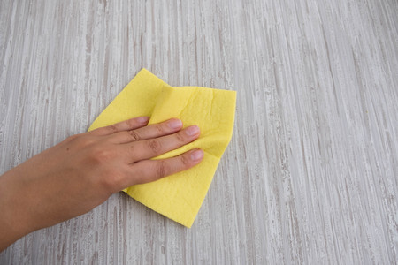 Housemaid cleaning a bathroom, closeup shot.の写真素材
