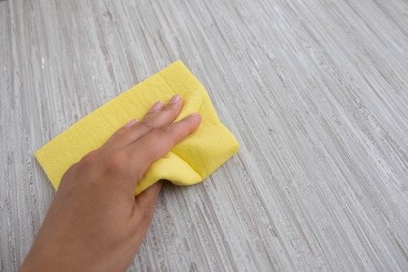 Housemaid cleaning a bathroom, closeup shot.の写真素材