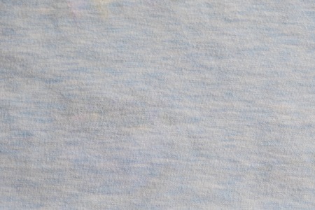 Grey heather texture. Grey fabric texture. Background with delicate striped pattern. Real heather grey knitted fabric made of synthetic fibres textured background.の写真素材