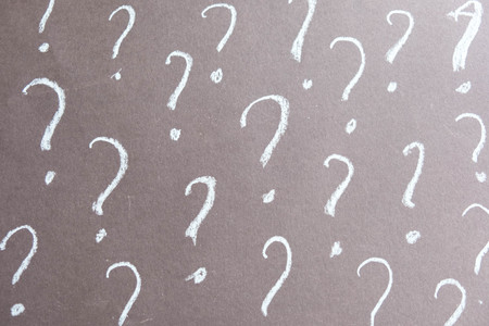 Question marks written on blackboard. Problems to solve conceptの写真素材