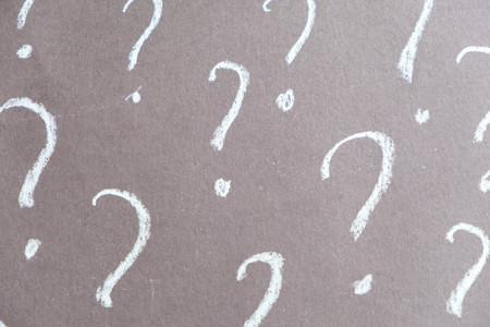 Question marks written on blackboard. Problems to solve conceptの写真素材