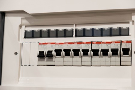 Closeup of a home automatic fuse switches. New control panel with electrical equipment. Automatic electricity switchersの写真素材