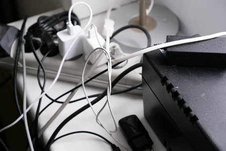 Multiple electrical plugs in wall outletの写真素材