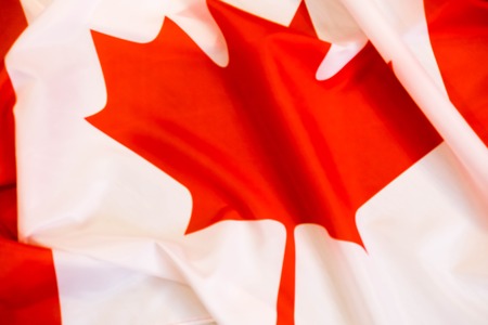 Canada flag in the old retro background effect, close upの写真素材