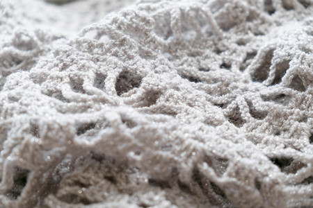 Grey knitting background texture, Knit woolen Christmas festive background for winter time.の写真素材