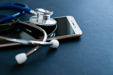 Stethoscope on smartphone, Checking security on smartphone concept.の写真素材