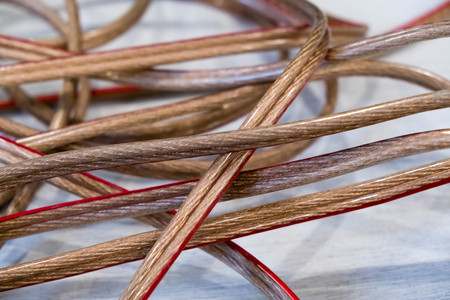 modern Fiber Optic Cable close-up tangled lying on the floorの写真素材