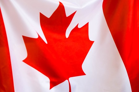 Canada flag in the old retro background effect, close upの写真素材