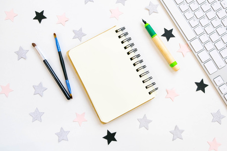 Stylish office table desk. Workspace with laptop, diary, succulent on white background. Flat lay, top viewの写真素材