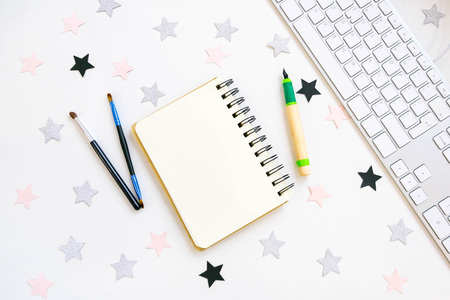 Flat lay, top view office table desk frame. feminine desk workspace with laptop, diary, succulent, glasses, watch on white background.の写真素材