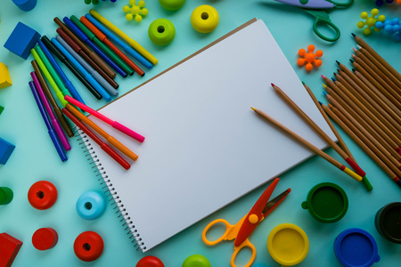 Top view on colorful paints and brushes. Creative ideas, creativity and early learning. Education concept.の写真素材