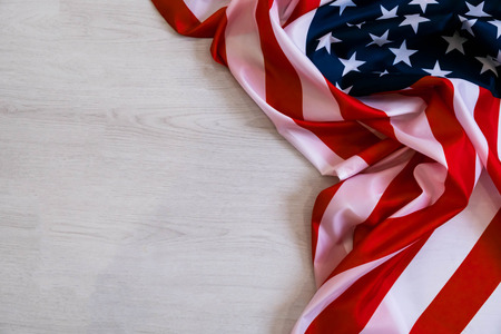 national flag of USA. Natural light. Selective focus. Close up on a gray background. Top view, flat lay. copy spaceの写真素材