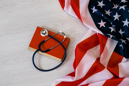 Close-up Photo Of Stethoscope On American Flagの写真素材