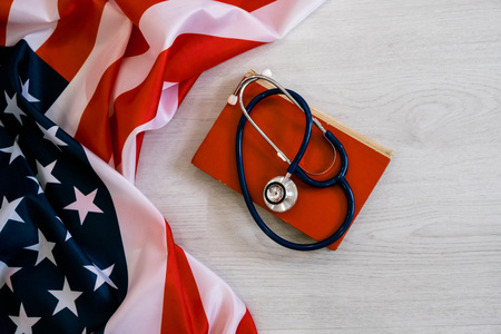 Close-up Photo Of Stethoscope On American Flagの写真素材