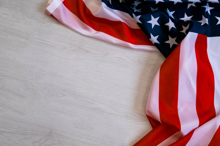 national flag of USA. Natural light. Selective focus. Close up on a gray background. Top view, flat lay. copy spaceの写真素材