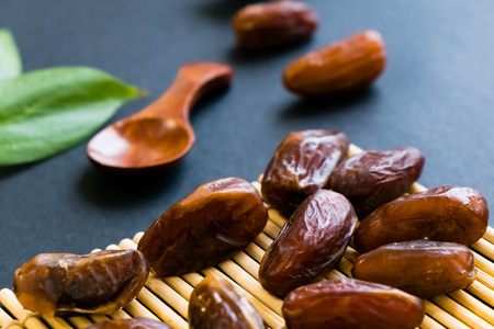 closeup sweet dried date palm fruits or kurma, ramadan (ramazan) foodの写真素材