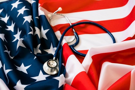 Close-up Photo Of Stethoscope On American Flagの写真素材