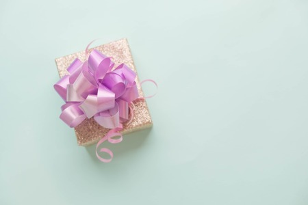 Creative minimal Christmas concept. winter vacation layout with gift boxes table space in middle design. Flat lay. Top view. New Year holiday backgroundの写真素材