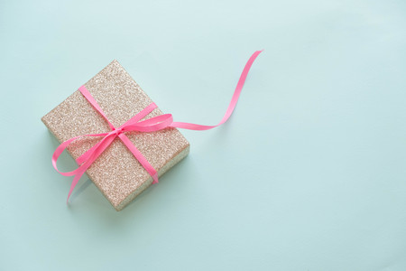Creative minimal Christmas concept. winter vacation layout with gift boxes table space in middle design. Flat lay. Top view. New Year holiday backgroundの写真素材