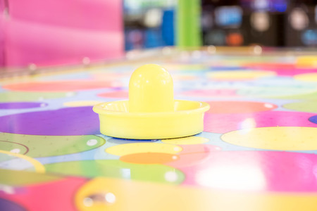 Air hockey game is fun even for adultsの写真素材