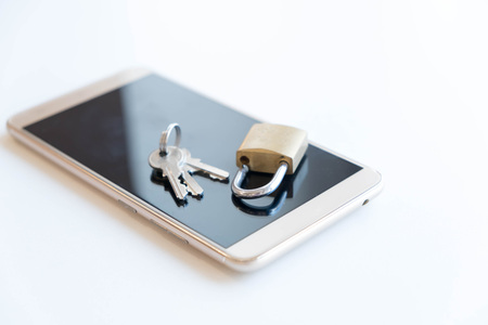 Telephone with lock, concept of protection of personal information. mobile phone security. chained smartphone. Security of smartphone. Low key lock, internet security smartphone data theft conceptの写真素材