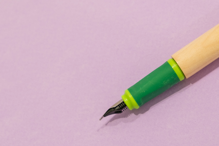 a fountain pen and a noteの写真素材