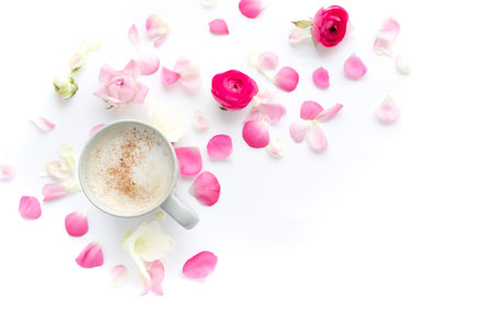 Romantic background with cup of coffee flowers over white table. Soft photo. Greeting card style....