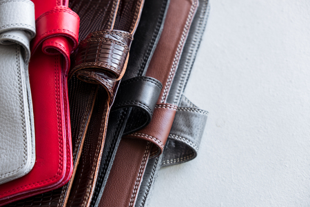 Stylish leather wallets on grey backgroundの写真素材