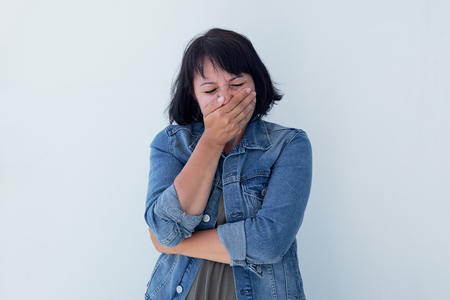 concept of stress woman head shot on white backgroundの写真素材
