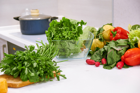 healthy foods are on the table in the kitchenの写真素材