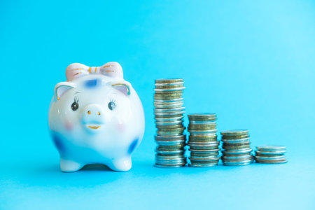 business financial ideas concept with coins stack and alarmclock isolate background with free copyspace for your creativity ideas textの写真素材