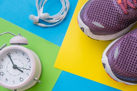 sneakers on a multi-colored background, concept infusion on sports.の写真素材