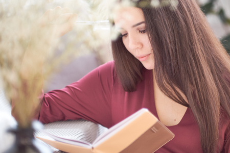 Students are studying and reading in the library. There study books.の写真素材
