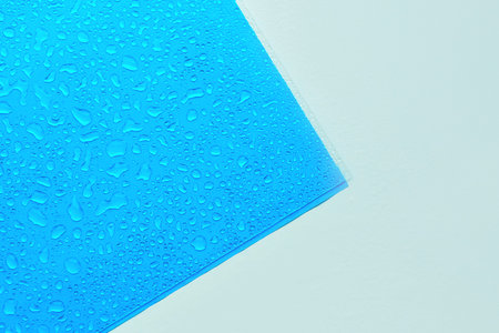 Water Drops On Blue Background, Texture colorful waterdrop.の写真素材