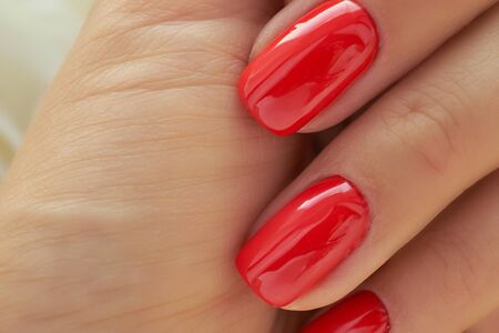 perfect red manicure. nail and hand care in the salonの写真素材