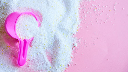 Measuring scoop with laundry powder