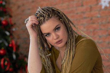Close up portrait of a beautiful young woman. Girl with perfect Makeup and Hairstyle. Model with...
