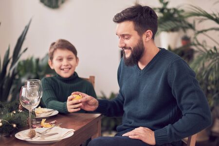 Family Together Christmas Celebration Concept. Family Enjoying christmas dinner backgroundの写真素材