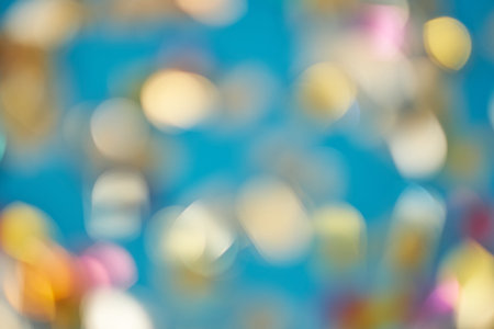 Festive blur background. Abstract twinkled bright background with bokeh defocused golden lights.