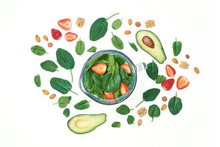 Healthy green smoothie blended with a blender. spinach and avocado on a white background top view....