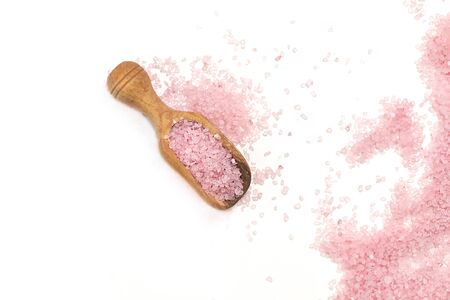 Pink salt isolated in scoop on white background. selective focus or blurryの写真素材