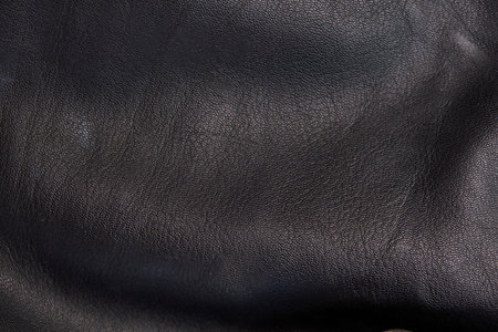 black leather texture seamless. High-resolution texture of folds. black calf leather