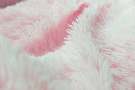 delicate soft background of plush fabric folds on white background. Copy space. Flat lay. loose...
